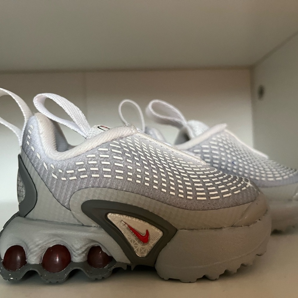 Nike Kids White and Gray Sneakers with Red Accents